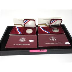Two 1984 US Olympic Silver Dollar Coins - .900