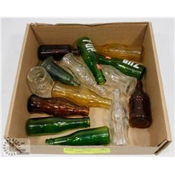 BOX OF MINIATURE COCA COLA & 7UP BOTTLES.