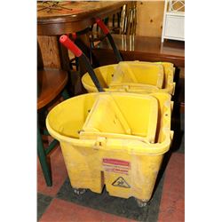 LOT OF 2 YELLOW JANITOR BUCKETS WITH MOP PRESS