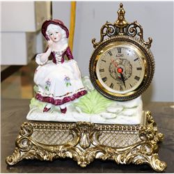 VINTAGE ECHO METAL AND PORCELAIN CLOCK