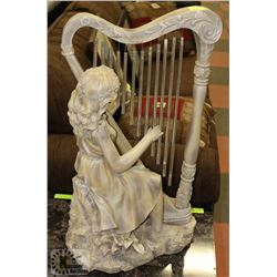 LADY PLAYING HARP.