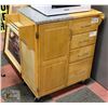 Image 1 : ROLLING KITCHEN CART WITH A STONE TOP AND PLENTY