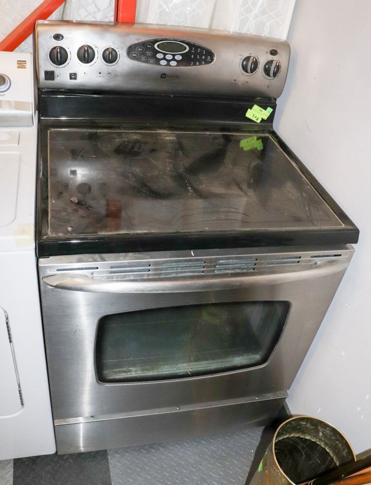 MAYTAG BLK AND STAINLESS CERAMIC TOP STOVE