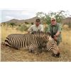 Image 2 : CAPE TO CAIRO 5-Day Hunt for Blue Wildebeest, Black Wildebeest or Burchell Zebra for 2-Hunters in No