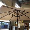 Image 2 : ASHLEY FLOOR MODEL BEIGE PATIO UMBRELLA, RETAIL $249