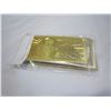 Image 1 : FOIL BILL AND BAG OF CURRENCY