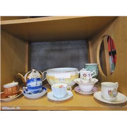 SHELF LOT OF CHINA CUPS, SAUCERS, TEAPOT, CHAMBER POT, ETC