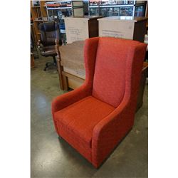 RED UPHOLSTERED WING BACK CHAIR