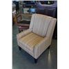 Image 1 : STRIPED UPHOLSTERED ARM CHAIR