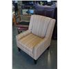 Image 1 : STRIPED UPHOLSTERED ARM CHAIR