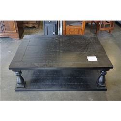 ASHLEY FLOOR MODEL RUSTIC BLACK FINISH 40X55 INCH COFFEE TABLE, RETAIL $1199