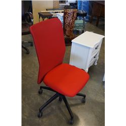 RED UPHOLSTERED OFFICE CHAIR
