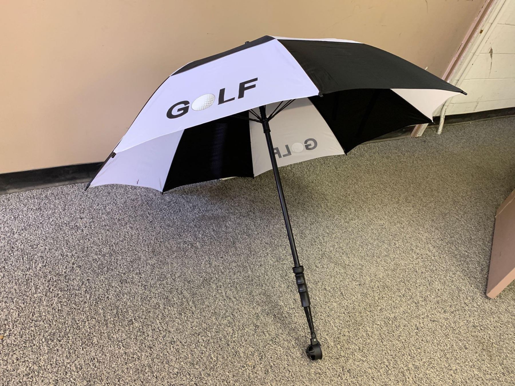 Golfers extending handle golf ball retriever Umbrella