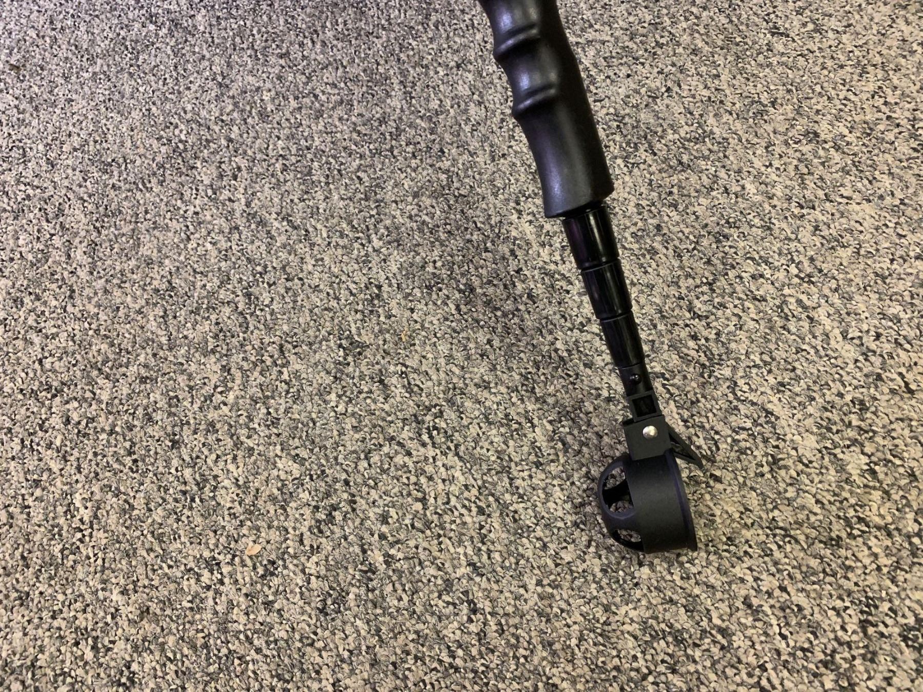 Golfers extending handle golf ball retriever Umbrella