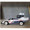 Image 2 : VINTAGE TYCO R/C PORSCHE RACE CAR