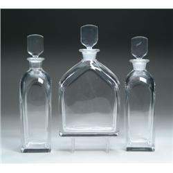 SET OF THREE CRYSTAL DECANTERS BY ORRIFORS