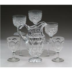 GOOD CUT GLASS HANDLED FOOTED PITCHER AND FIVE MI