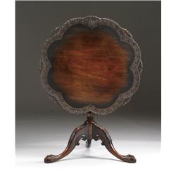 REPRODUCTION MAHOGANY CARVED TILT TOP TEA TABLE