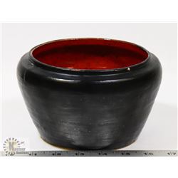 73) BLACK ON DEEP RED GLAZED POT SIGNED M HOLMES