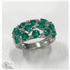 Image 1 : MODERN EMERALD AND DIAMOND CLUSTER DINNER RING