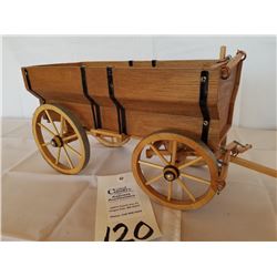 Wood carved triple box grain wagon