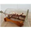 Image 2 : carved bobsled in a bottle