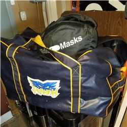 SNOWBOARD BAG, HELMET BAG, AND SNOWBOARD HELMET IN HOCKEY BAG