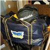 Image 1 : SNOWBOARD BAG, HELMET BAG, AND SNOWBOARD HELMET IN HOCKEY BAG