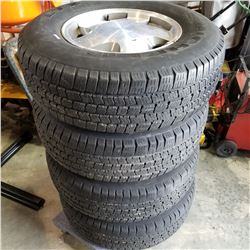 SET OF 4 MICHELIN 245.75 R16 TIRES ON 6 BOLT RIMS