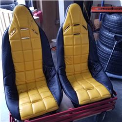 2 YELLOW AND BLACK RACING SEATS