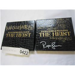 2 AUTOGRAPHED CDS OF MACKLEMORE AND RYAN LEWIS