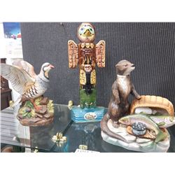 THREE DECORATIVE LIQUOR DECANTER