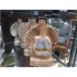FOUR SEASHELL DECANTER BOTTLES