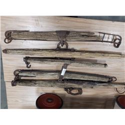 FIVE WOODEN YOKES