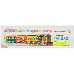 VINTAGE ZIG ZAG EXPRESS TIN LITHO TOY.