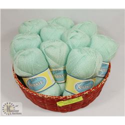 10 BALLS OF BABY YARN GREEN WITH SATIN THREAD.