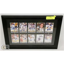 FRAMED 10 CONNOR MCDAVID UPPERDECK HOCKEY CARDS.