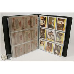 TWO SETS OF STRANGER THINGS TRADING CARDS.