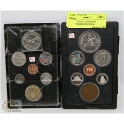 LOT OF ASSORTED WORLD COINS/TOKENS IN CASES