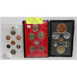 LOT OF ASSORTED WORLD COINS/TOKENS IN CASES