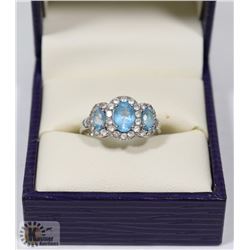 10K WHITE GOLD DIAMOND AND TOPAZ RING. SIZE 6.5