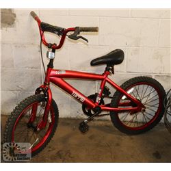 TORRID KIDS RED BIKE.