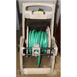 SUNCAST HOSE CART W/ HOSE AND NOZZLE.