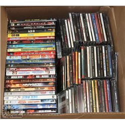 BOX OF ASSORTED DVDS AND CDS.