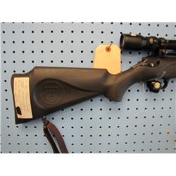 g106... Thompson Center impact muzzleloader 50 cal break open with Bushnell scope