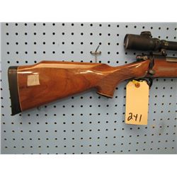 g061... Remington model 700 bolt-action 300 Win Mag with Burris scope