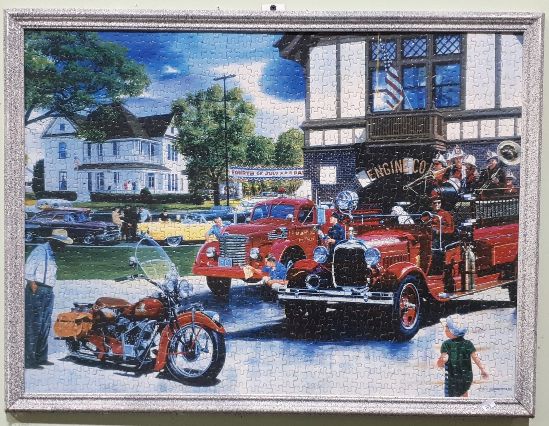 TWO FRAMED JIGSAW PUZZLES