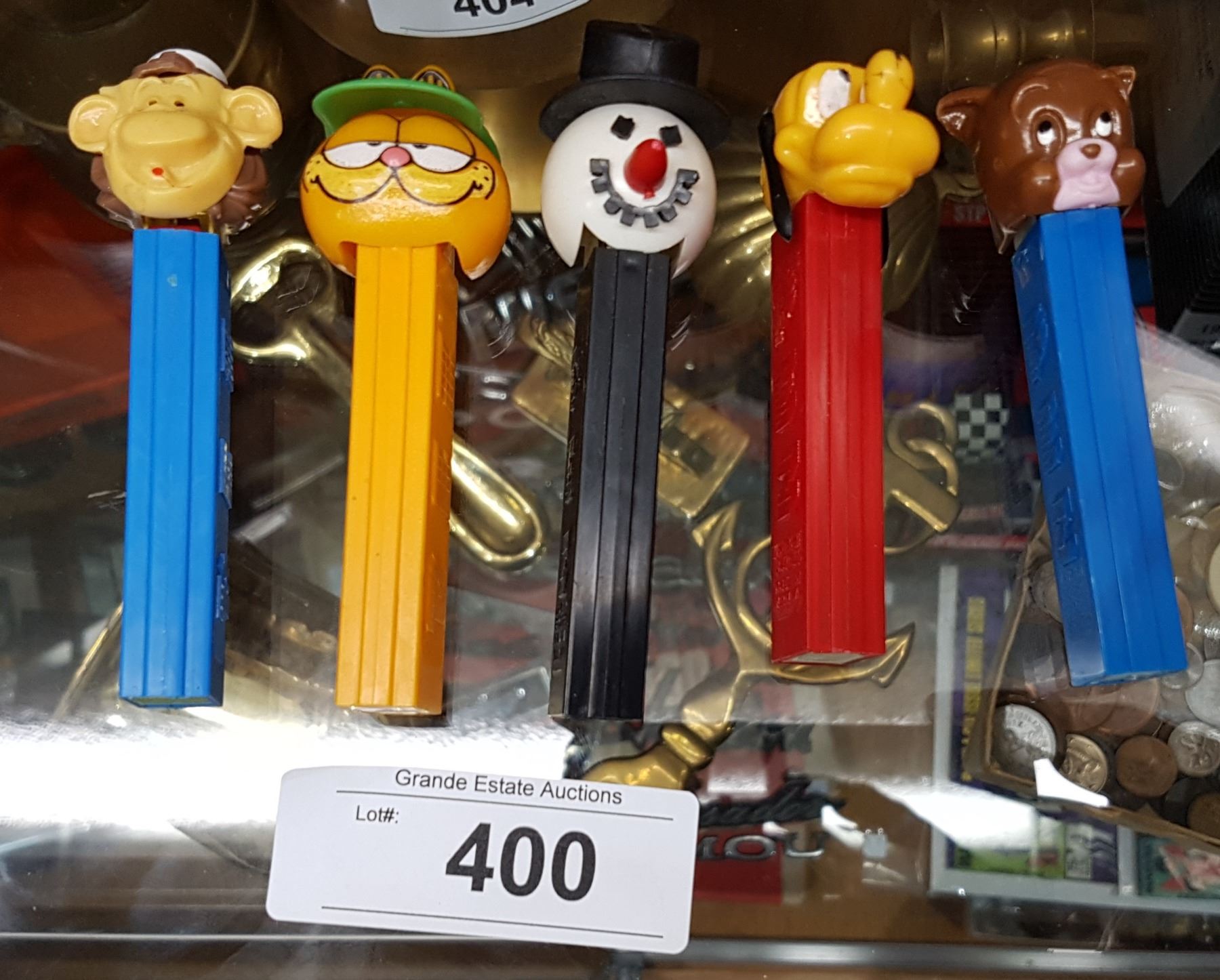 FIVE VINTAGE PEZ DISPENSERS