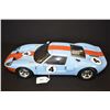 Image 1 : Motormax 1: 12 scale die cast Ford GT with opening doors and engine compartment, 15" in length