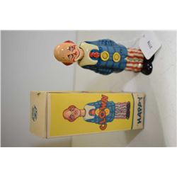 German made Distler Happy Clown wind-up tin toy with original box and key